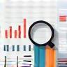 Market analysis icon - chart with magnifying glass
